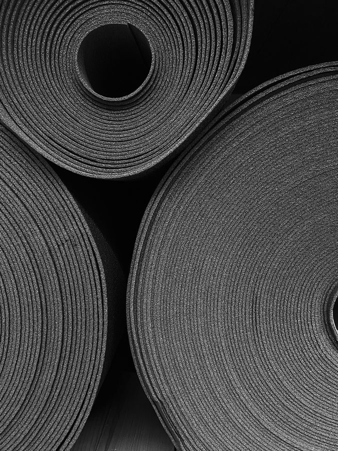 Nonwoven geotextile fabric close-up showing fiber texture