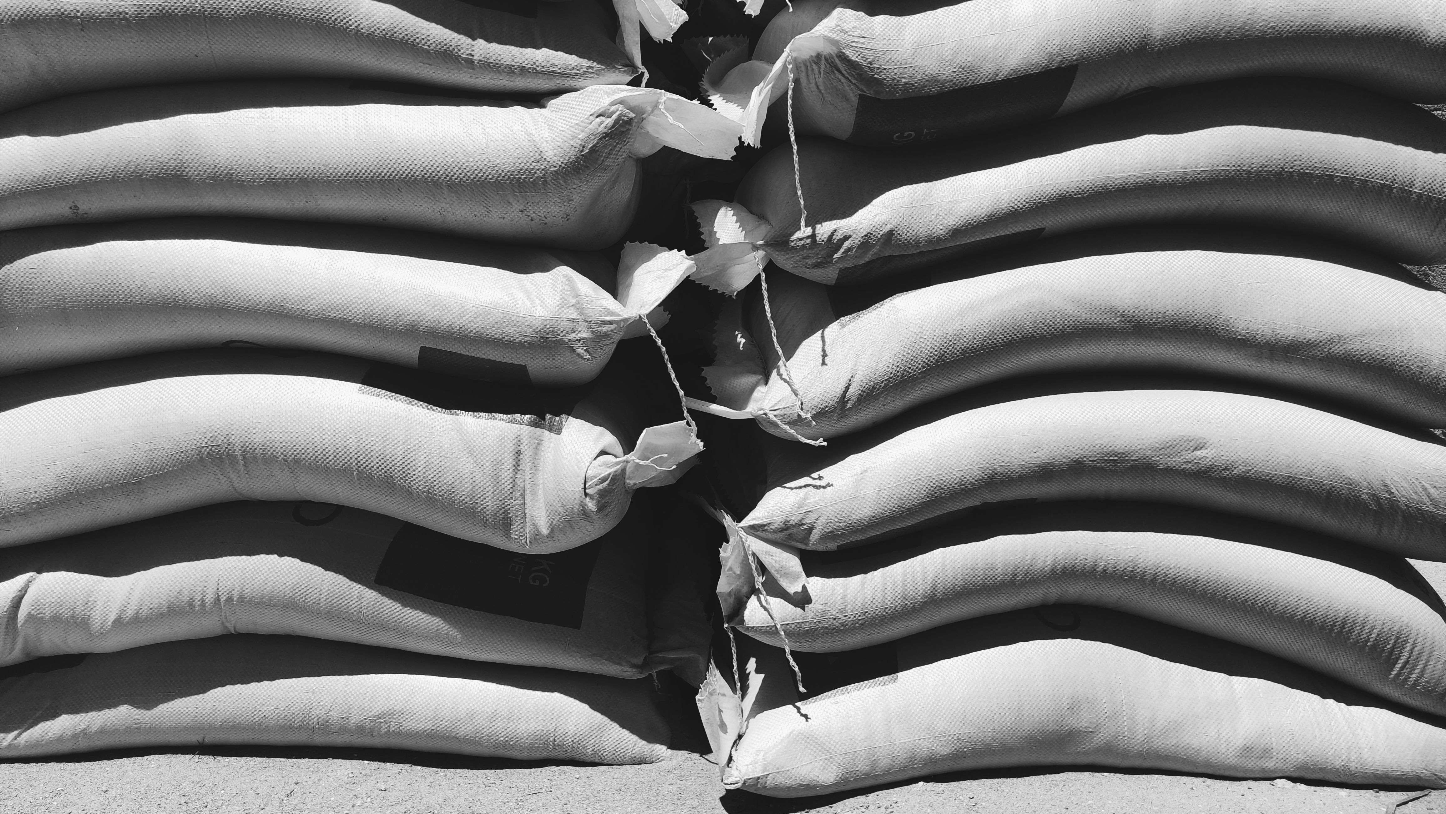 Stacked woven polypropylene sandbags