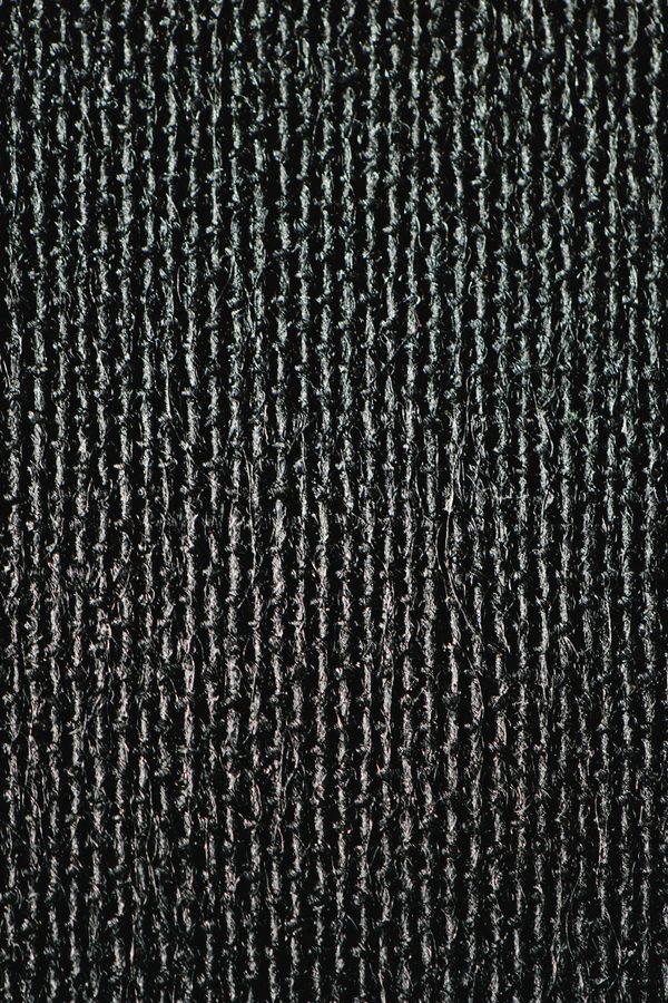 Woven geotextile fabric rolls stacked